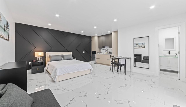 XL Luxury Room. Luxurious studio retreat with sleek designs.