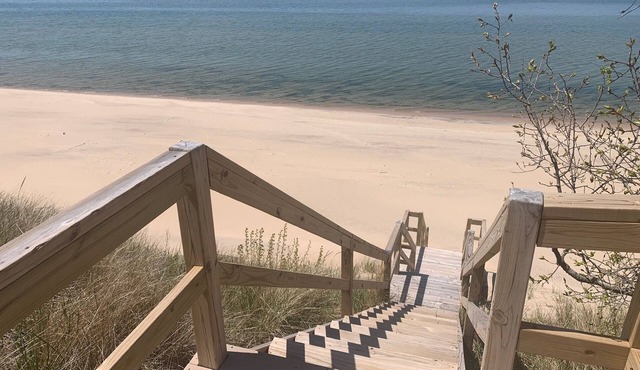 Yay the beach! Lake Michigan beach front cottage, adjacent to dunes & park.