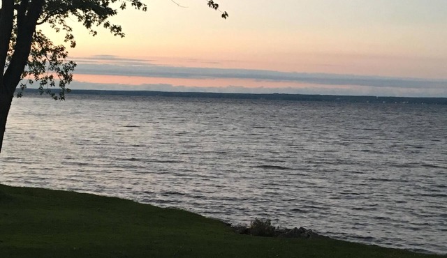 Year round beauty and tranquility in this lakefront home with dock.