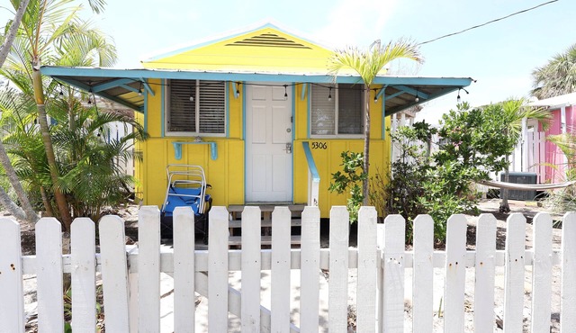 Yellow Palm Cottage steps from the beach
