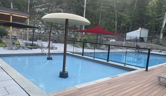 You’ll fall in love! Brand new family unit at Mont Owl’s Head with a dock!