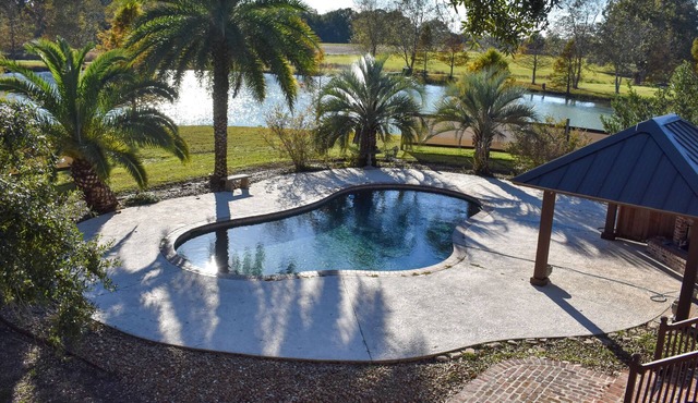 Youngsville Retreat- pool, private pond, outdoor fireplace