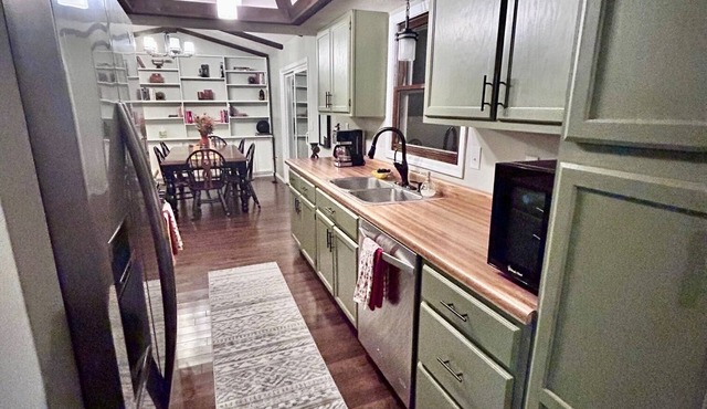 Your charming 3-bedroom cottage retreat awaits! 10min to IU Stadium!