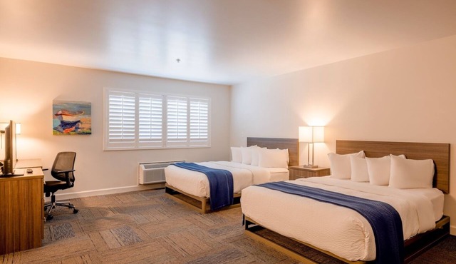 Your Coastal Hideaway: Two Queen Room