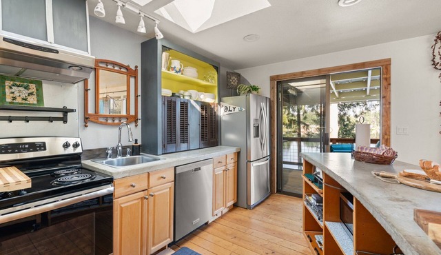 Your eclectic escape! Lakefront home in Lacey w/private patios and dock