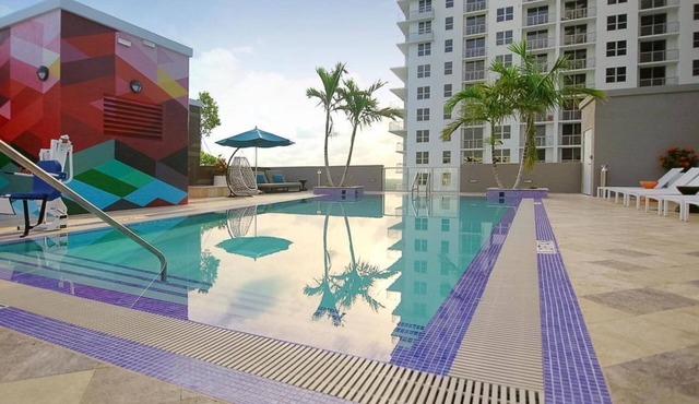 Your Modern Retreat – 2BR with Pool & Gym