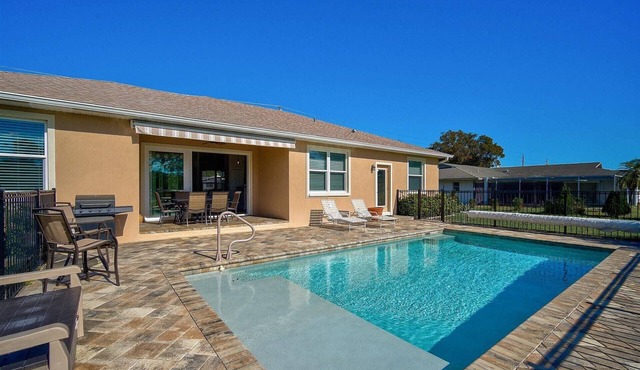 Your Serene Escape: Pool, Elegant 3BR Home with Gourmet Kitchen, Minutes to Dining and Shopping!