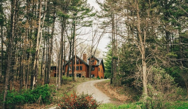 You’ve Found Paradise With this Spacious Log Cabin on Keuka Lake -