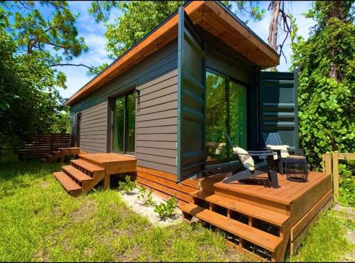 Zen Container Tiny Home with Fenced-in Yard, Fire Pit, Centrally located and Pet Friendly