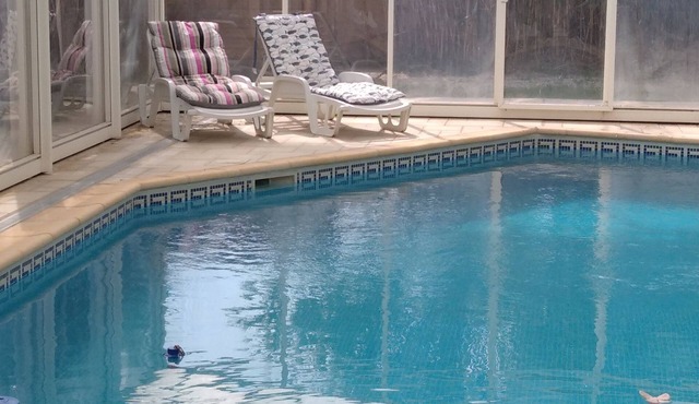 Zen house located in a village between land and sea.