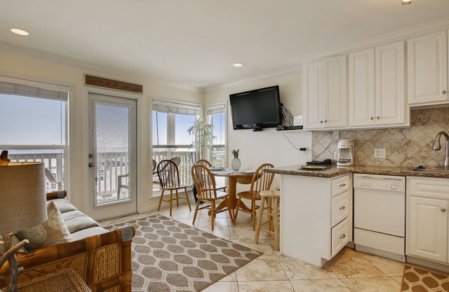 Beach Cottage steps from Surf. fishing. the Beach and Serene Sunsets (1303)
