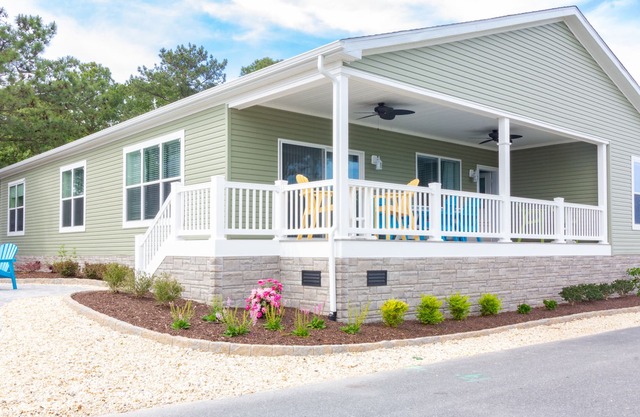 Beautiful home steps from waterfront, private beach, pools, pet friendly!