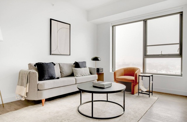 Bright Central Square 1BR w/Gym, W/D & Roof, near T, by Blueground