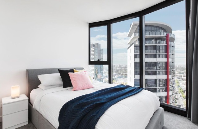 Chic 2-Bedroom Apartment High Above The City