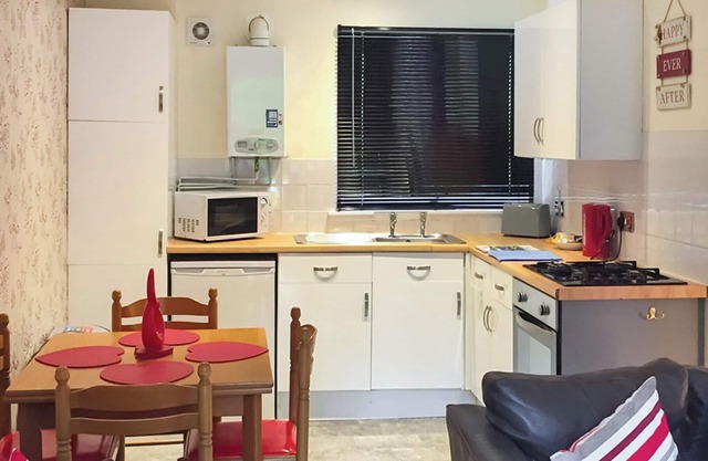 Comfortable semi-detached lodge with one double and one twin.