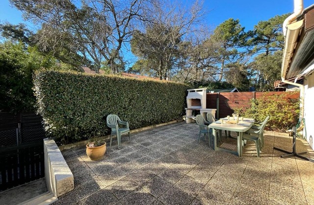 Cozy Villa Near Beach with Shared Pool, Patio, and Parking