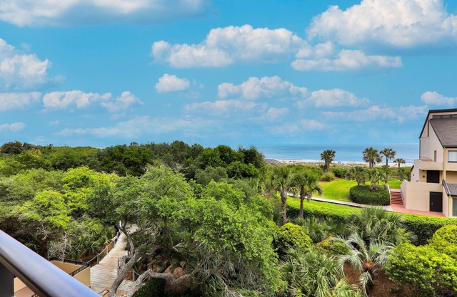 Elegant ocean-view townhome with beach access & pool - perfect location