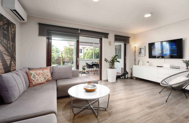 Holiday home with garden and barbecue