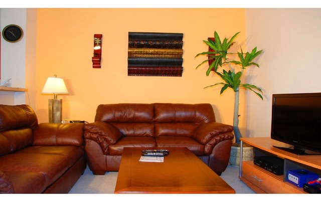 Home in gated community with public pool. 5-min drive to Disney.