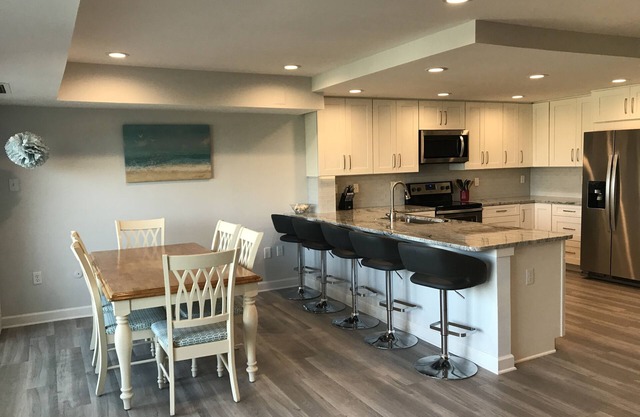LINENS & DAILY ACTIVITIES INCLUDED! OCEANFRONT/BOARDWALK BUILDING W/ROOFTOP POOL Completely remodeled kitchen with all-new cabinets and appliances, open floor plan and eat-at counter.