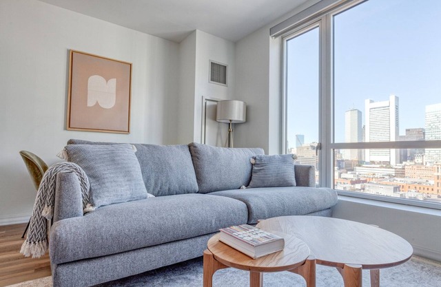 Luxe Seaport Studio w/ W/D, Gym, Outdoor Space, by Blueground