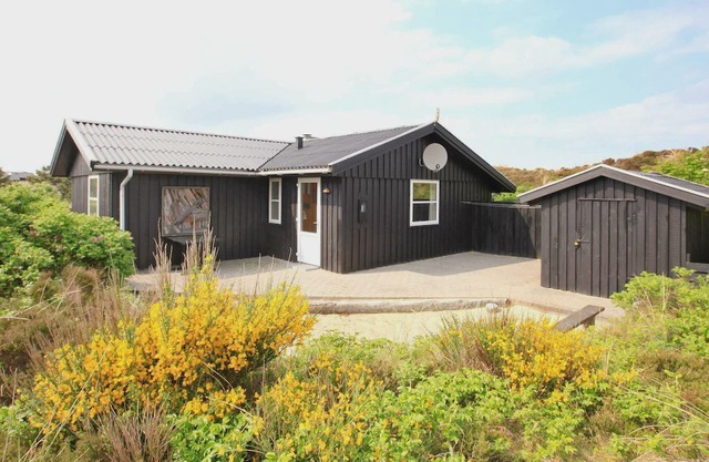 Modern Holiday Home in Henne with Sauna