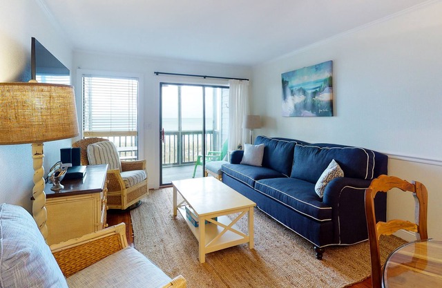 Second-Floor, Oceanfront Condo with Balcony, WiFi, Laundry & Shared Pool