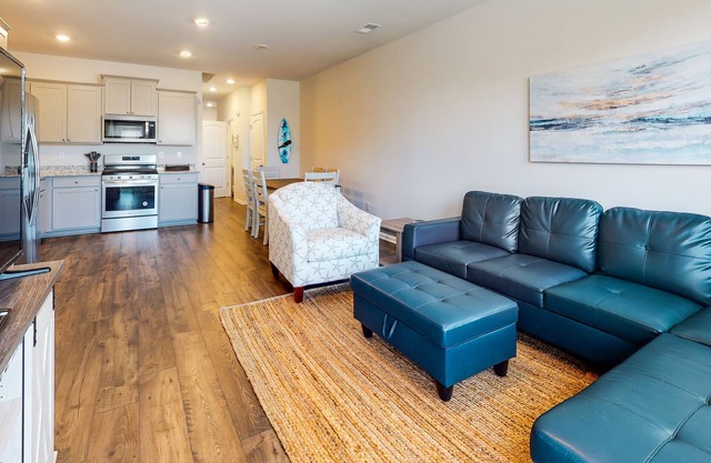 Stylish ocean view Beach Club townhouse with shared pool, sauna, tennis, & gym