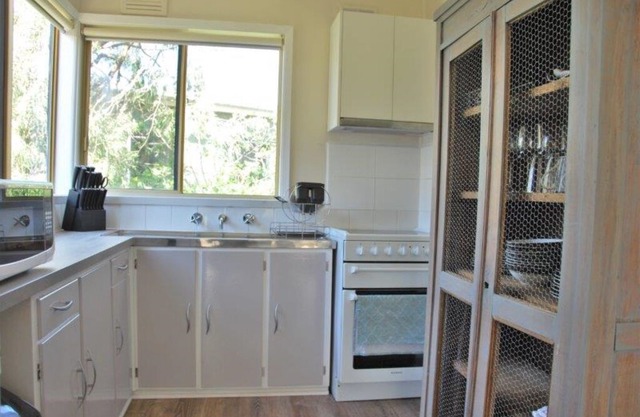 The Surf Shack is a short walk to the beautiful beach for relaxation or surfing.