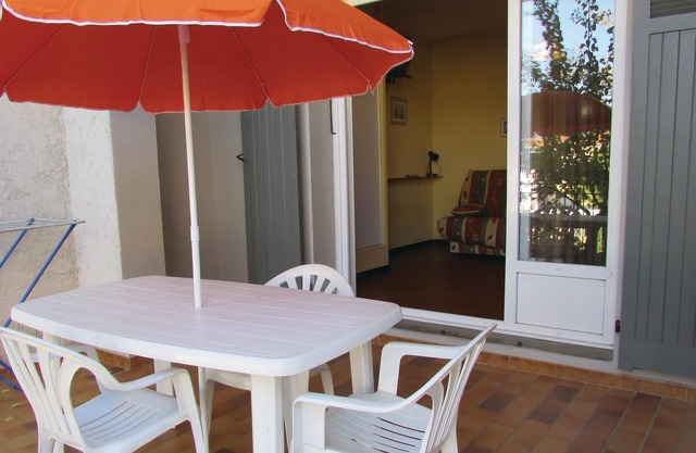 These charming vacation apartments (see FKO114) with a view of the Corsican mountains are part of a