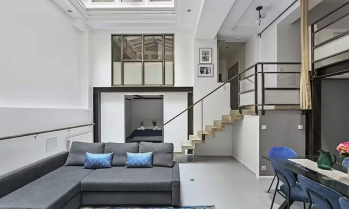 Quartier des Grandes-Carrieres Apartment | Paris' Hidden Gem: An Exquisite Theatre Loft in the heart of Montmartre