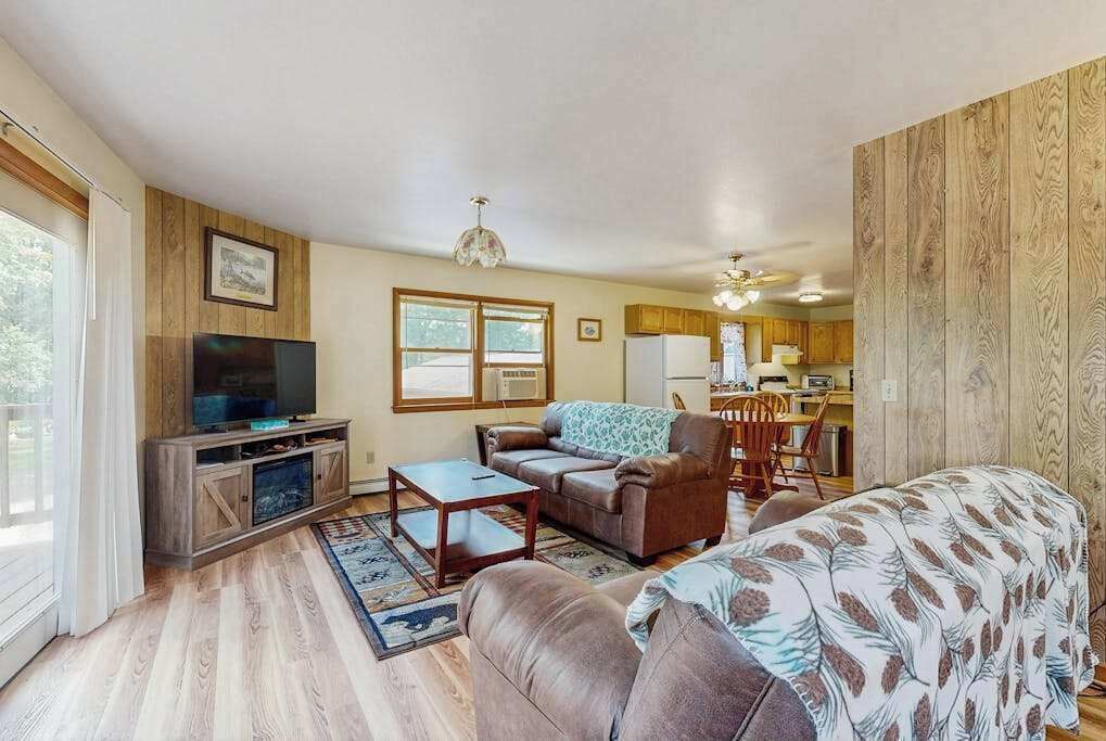 Friendship House | Cozy wooded duplex w/WiFi, full kitchen, shared W/D & near lakes & trails