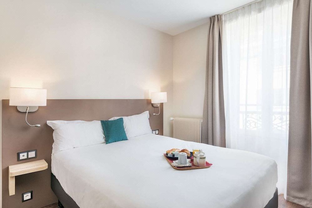 Photo of Bedroom in Quartier de la Plaine-de-Monceaux