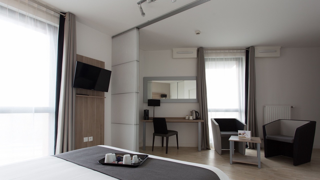 Photo of Bedroom in Hotel-de-Ville