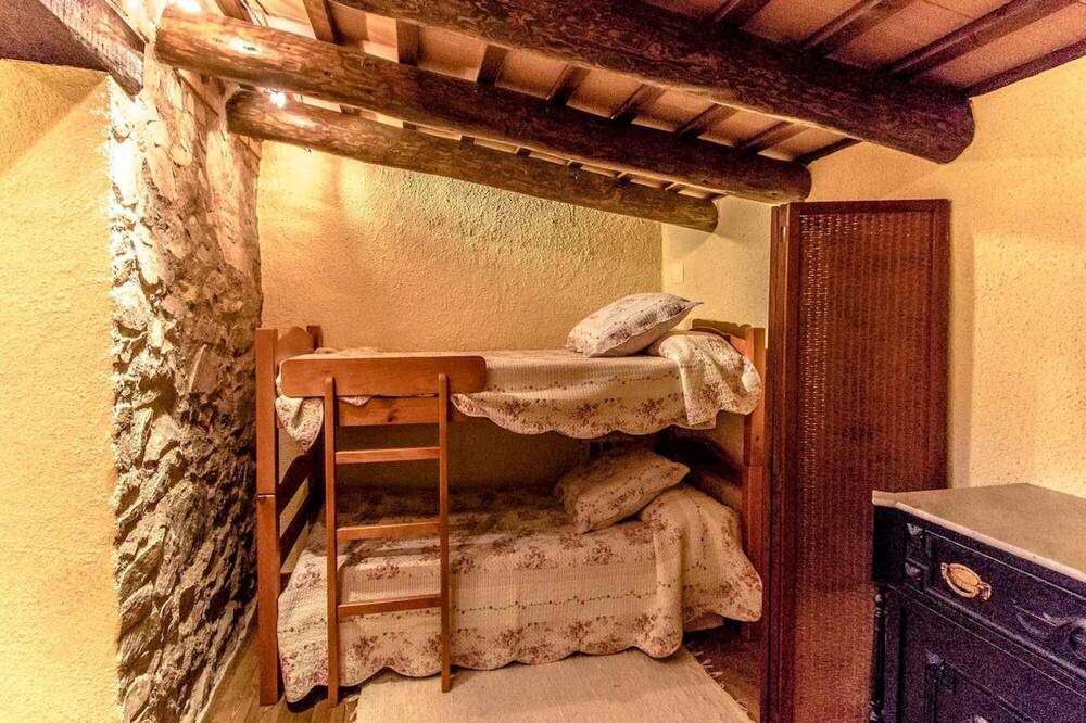 Photo of Bedroom in Sant Feliu de Buixalleu