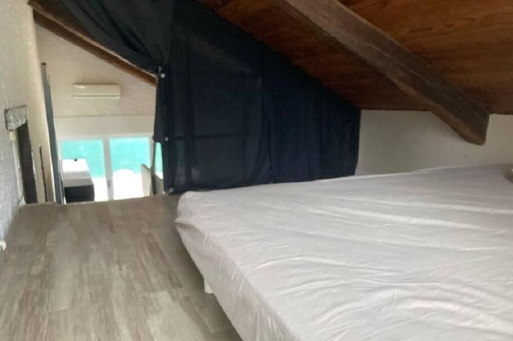 Photo of Bedroom in Up 1.5 Saint-Ferreol