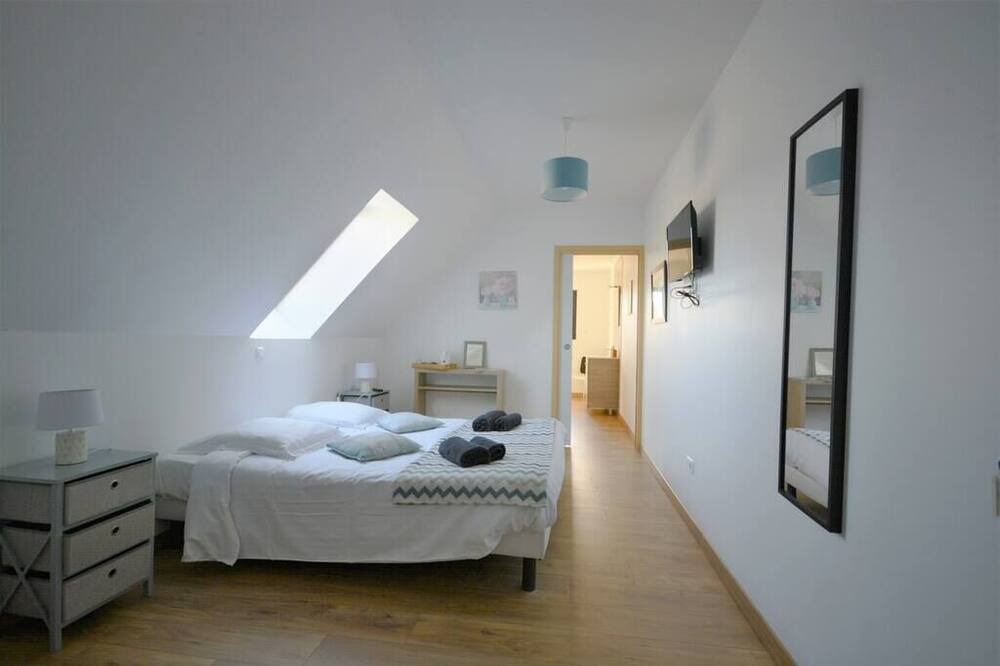 Photo of Bedroom in Saint-Quentin-en-Tourmont