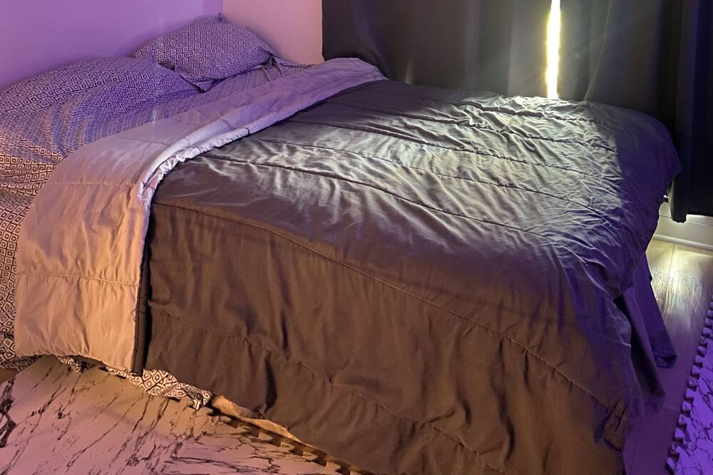 Photo of Bedroom in Bout-de-l'Ile