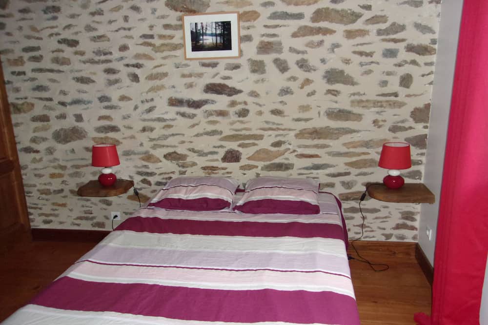 Photo of Bedroom in Laval-sur-Luzege