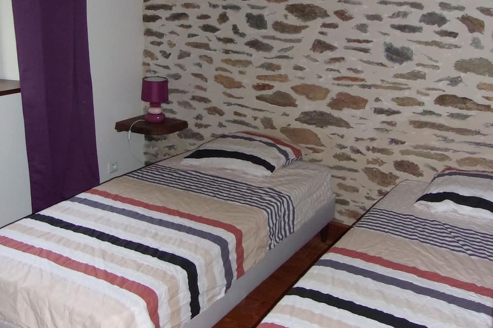 Photo of Bedroom in Laval-sur-Luzege