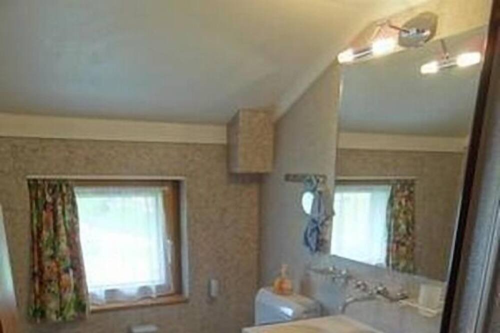 Photo of Bathroom in Madulain