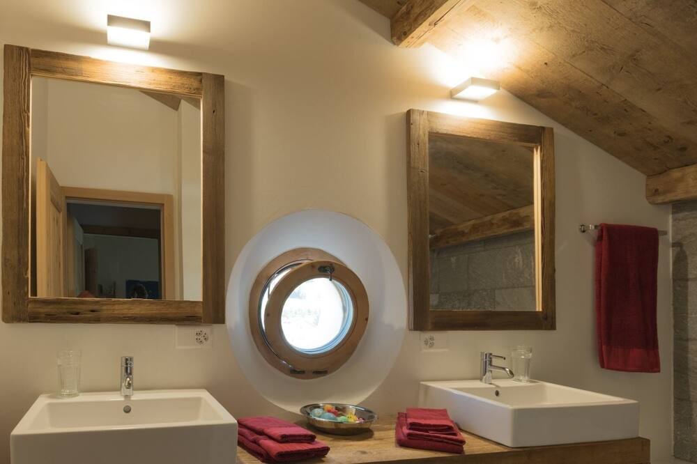 Photo of Bathroom in La Punt-Chamues-ch