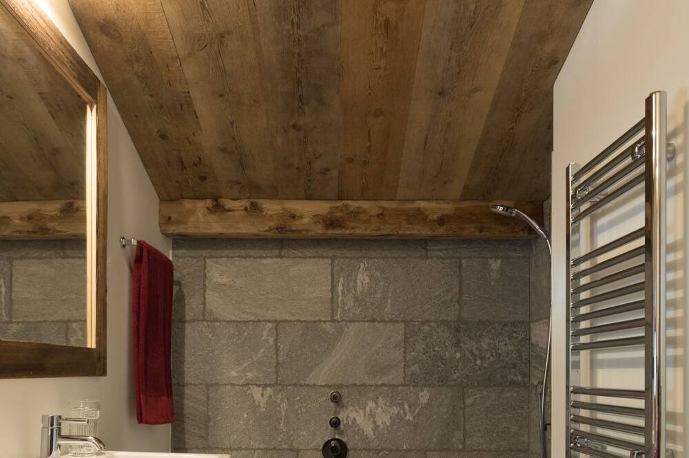 Photo of Bathroom in La Punt-Chamues-ch