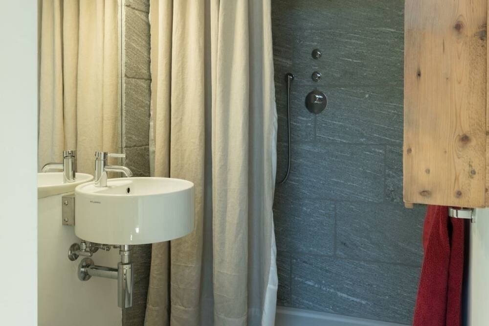 Photo of Bathroom in La Punt-Chamues-ch