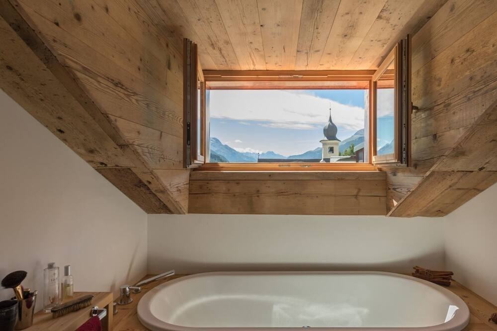 Photo of Bathroom in La Punt-Chamues-ch