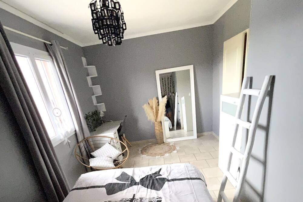 Photo of Bedroom in Saint-Julien-les-Rosiers