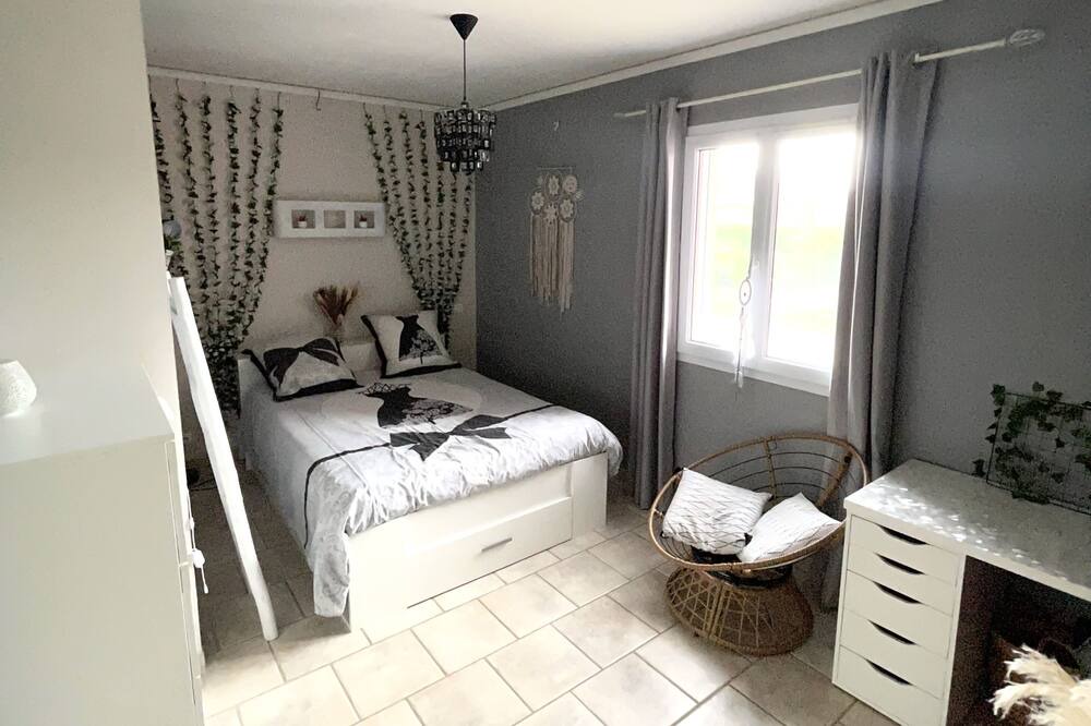 Photo of Bedroom in Saint-Julien-les-Rosiers