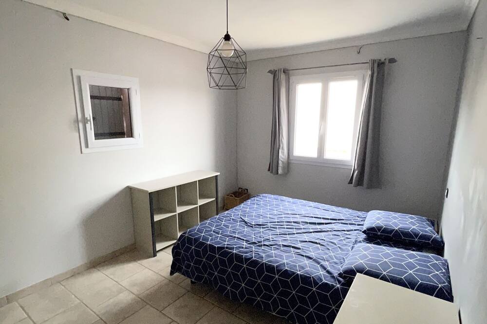 Photo of Bedroom in Saint-Julien-les-Rosiers
