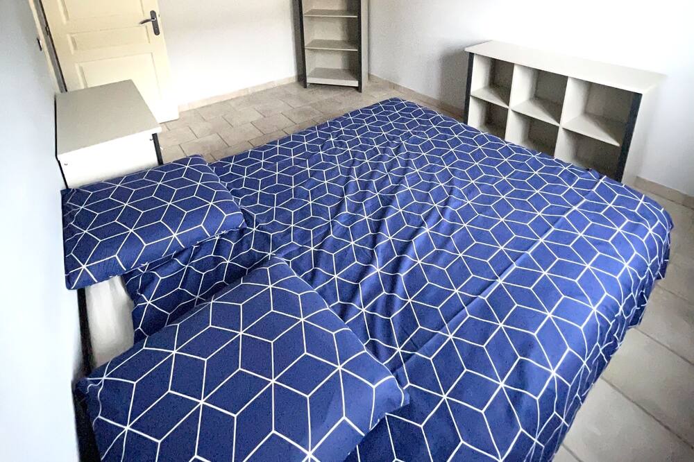 Photo of Bedroom in Saint-Julien-les-Rosiers