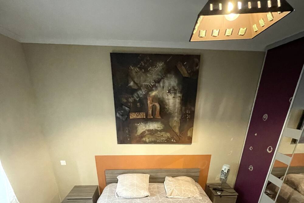 Photo of Bedroom in Saint-Julien-les-Rosiers
